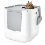 Modkat XL Litter Box top-entry configuration with cat poking its head out the top