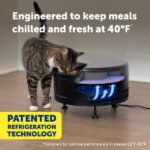 Cat using a pet refrigerated feeder with text about meal temperature control.